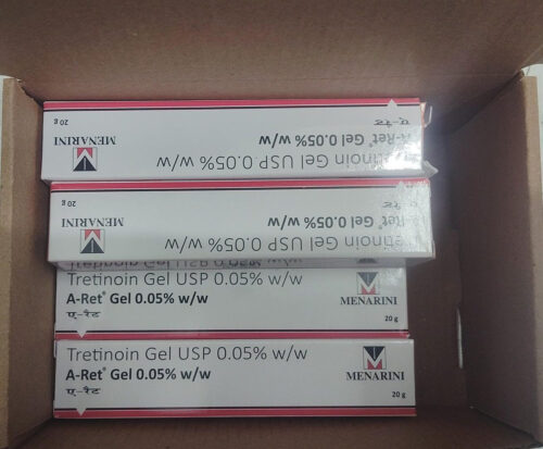 Boxes of Menarini A-Ret Gel 0.05% tretinoin gel inside a cardboard shipping box with red accents on the edges.